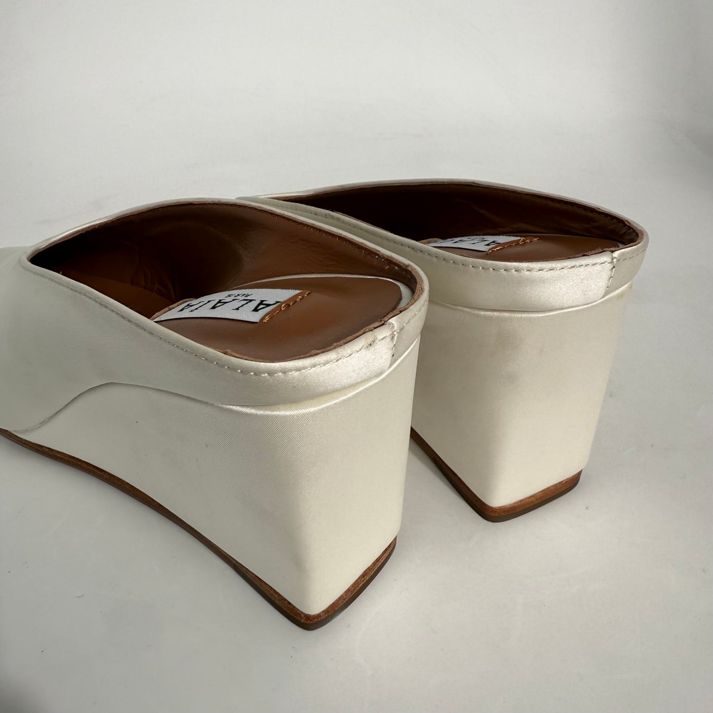 Alaïa White Staib Point-Toe Wedge Mules