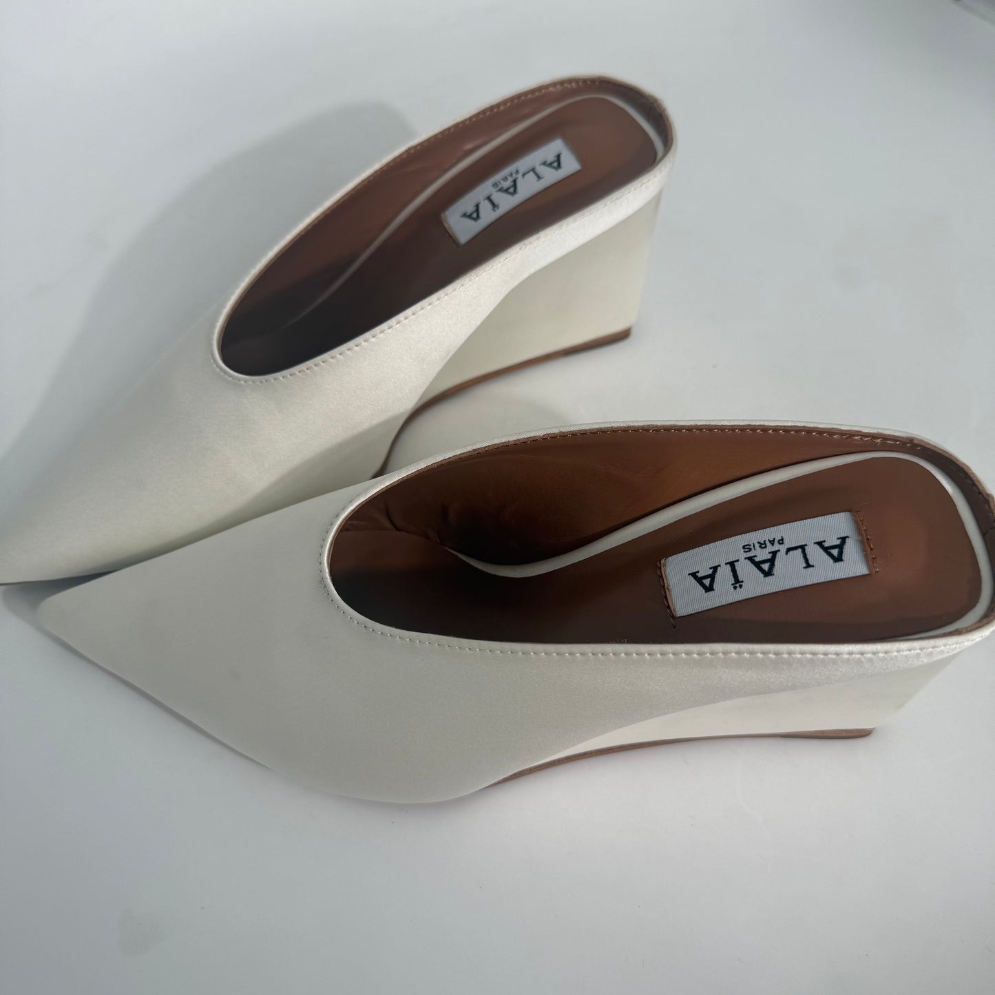 Alaïa White Staib Point-Toe Wedge Mules