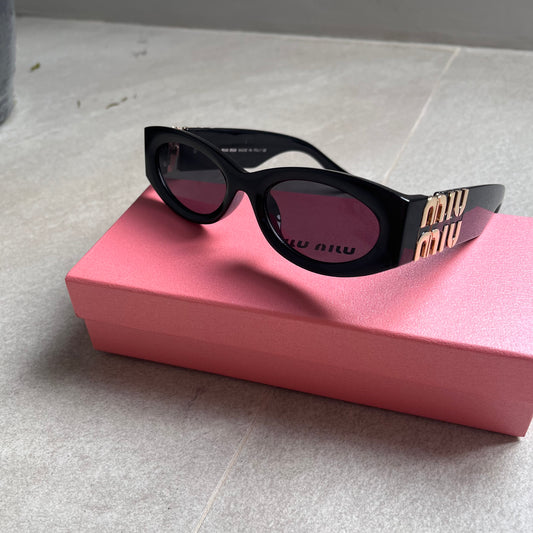 Miu Miu Oval Sunglasses