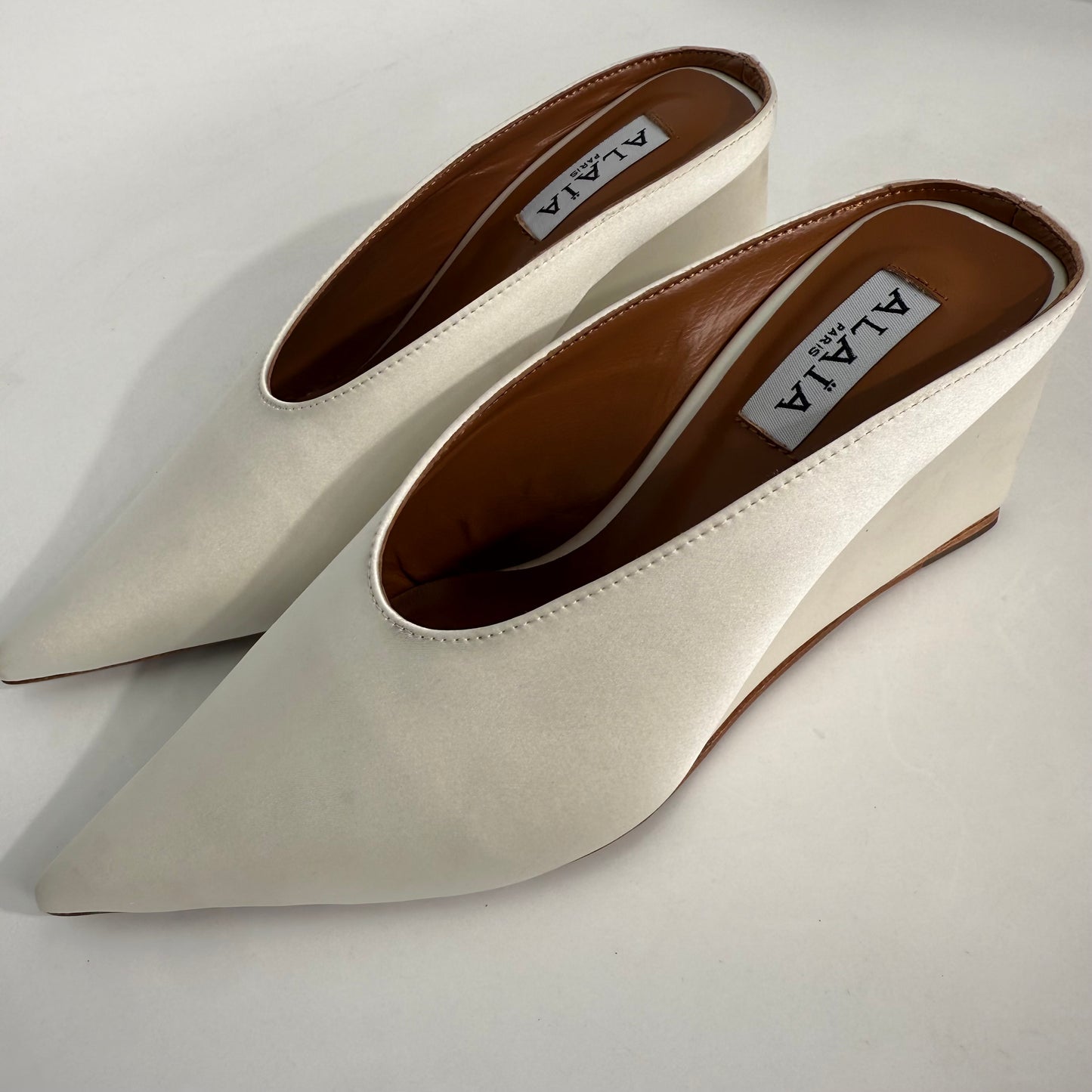 Alaïa White Staib Point-Toe Wedge Mules