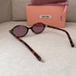 Miu Miu Regard Sunglasses